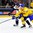 BUFFALO, NEW YORK - JANUARY 2: Sweden's Fabian Zetterlund #28 and Slovakia's Marek Korencik #7 battle for puck possession during the quarterfinal round of the 2018 IIHF World Junior Championship. (Photo by Andrea Cardin/HHOF-IIHF Images)

